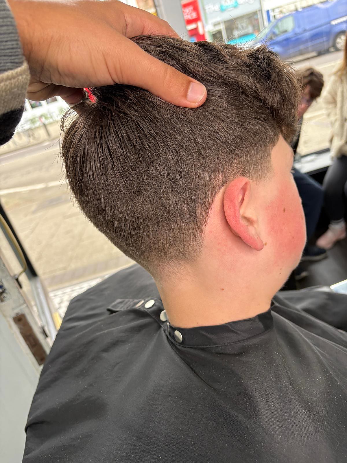 Junior cut, clean taper around the ear